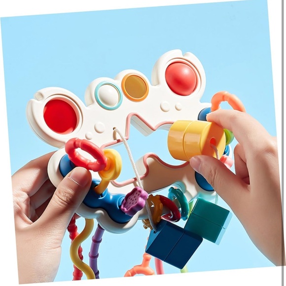 Baby👶🏻Pull String Pumping Teether Sensory Tummy Time & Fine Motor Skills Toy - Picture 6 of 11